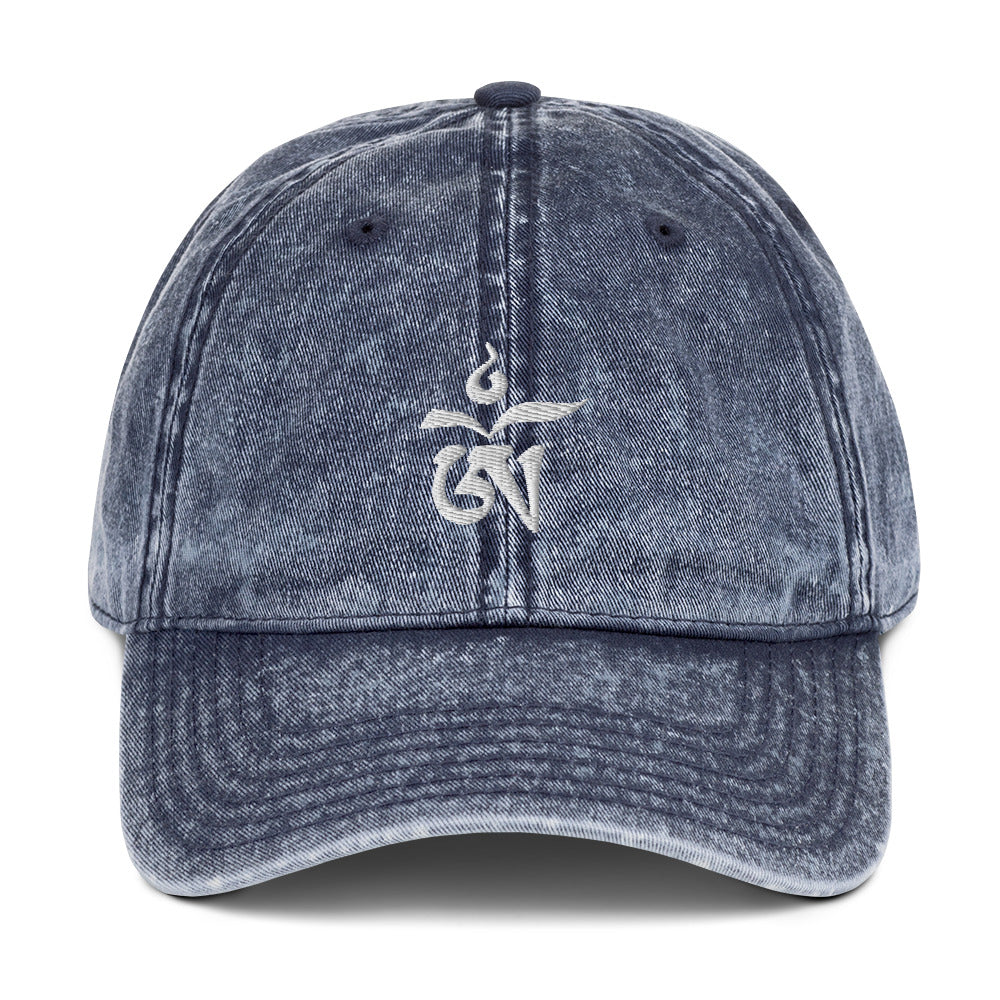 OM Vintage Cotton Twill Cap is designed under Dzimig Studios' Tibet Archive Project. This one's really special thanks to the intricate embroidery detail and the washed out vintage feel. These vintage Tibetan hat are available in four distinct colors for your choice.